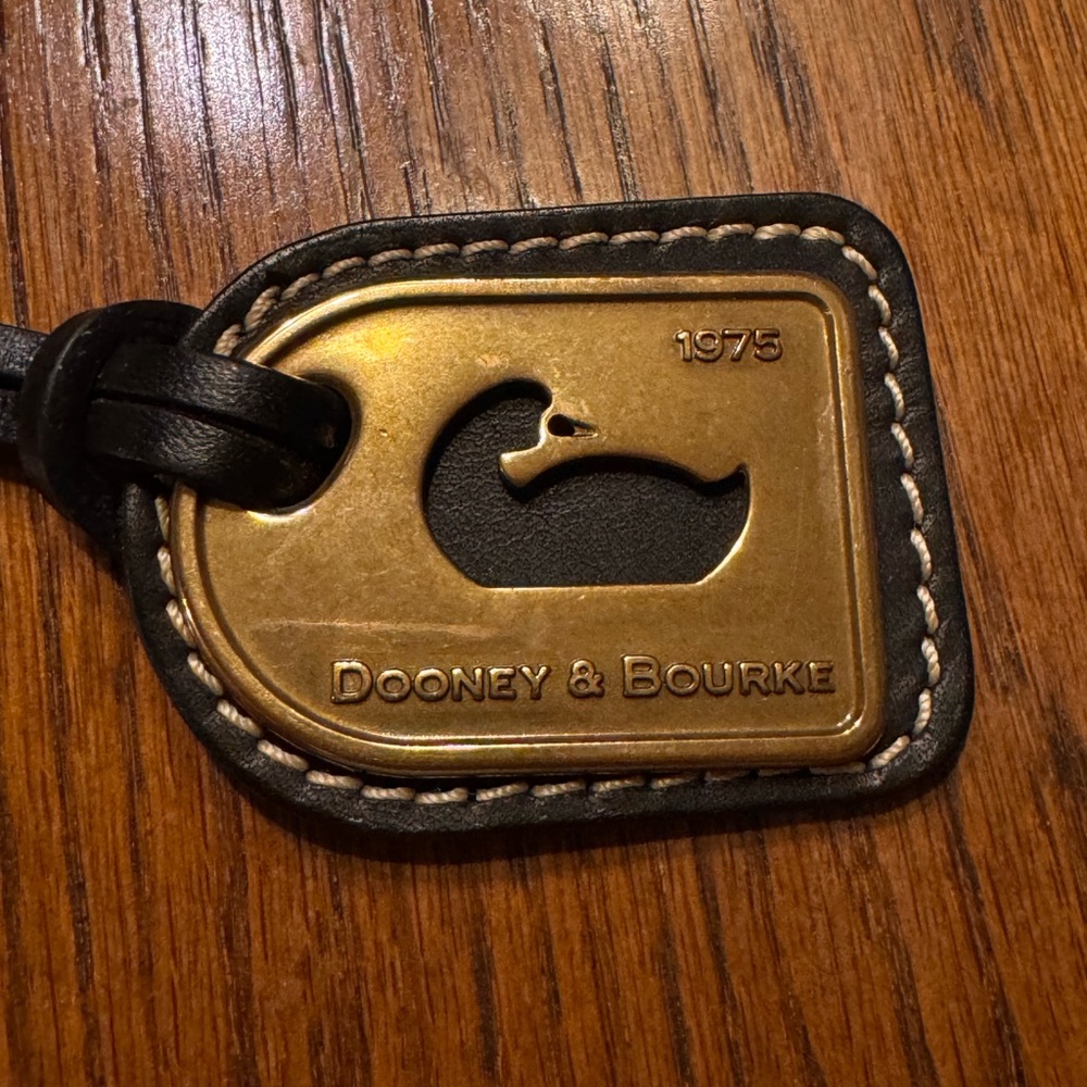 Dooney & Bourke brown and Gold purse accessory or key chain